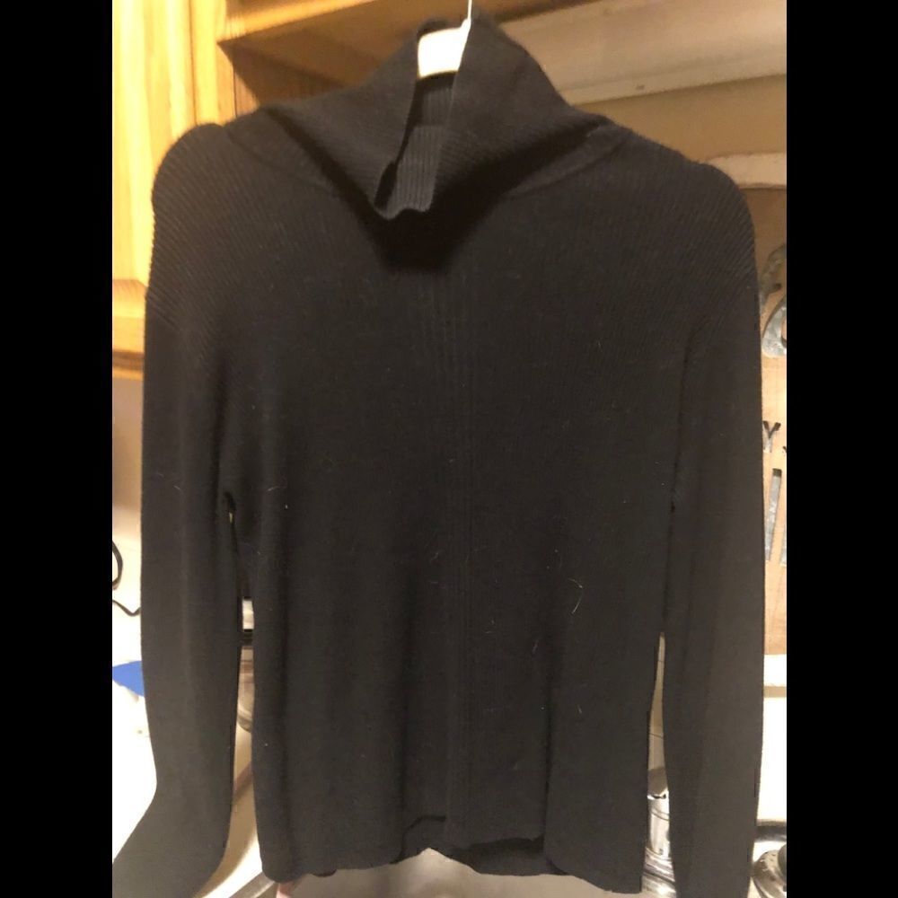 Traditional black turtleneck sweater